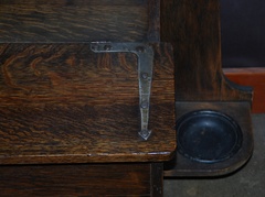 Pewter strap hinge hardware on bench lid.